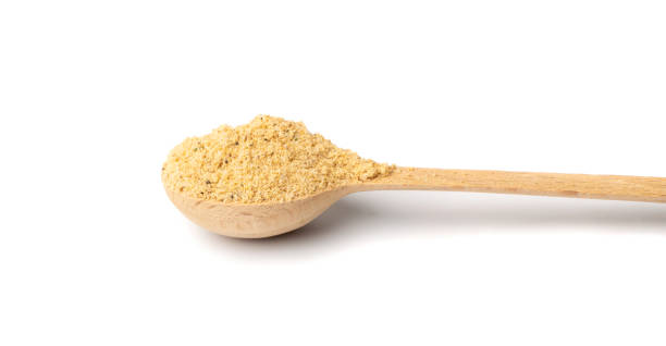 istock Soup Powder Isolated, Powdered Broth in Wooden Spoon 1420944659