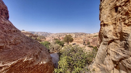 Dana Biosphere Reserve, with sandstone cliffs, red rock escarpments and lush valleys.