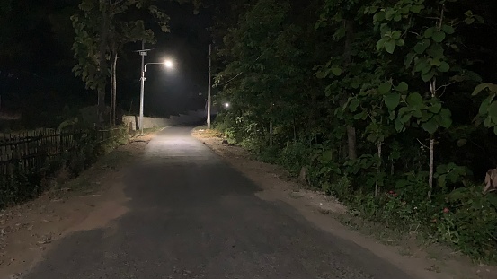 Quiet road in the dark night at Wonogiri Indonesia