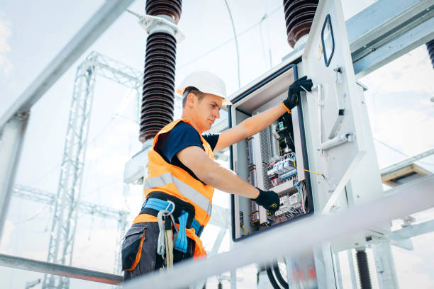 istock Adult electrical engineer inspect the electrical systems at the equipment control cabinet. Installation of modern electrical station 1420952749