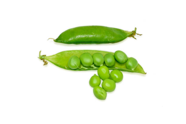 istock Sweet fresh green peas isolated on white background 1420955631