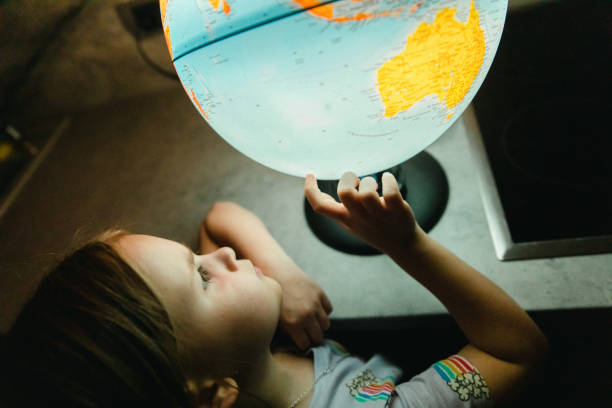 Kid throwing the globe object