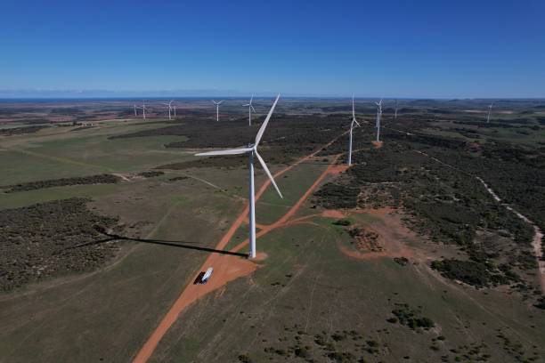 istock Drone photo of wind turbines in the paddock 1420965617