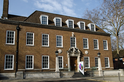 London, UK - March 21, 2022: Facade of the historic Foundling Museum in Brunswick Square, Bloomsbury, London.  The museum tells the story of the charity formed in the 18th century by Thomas Coram to help underpriviledged children.