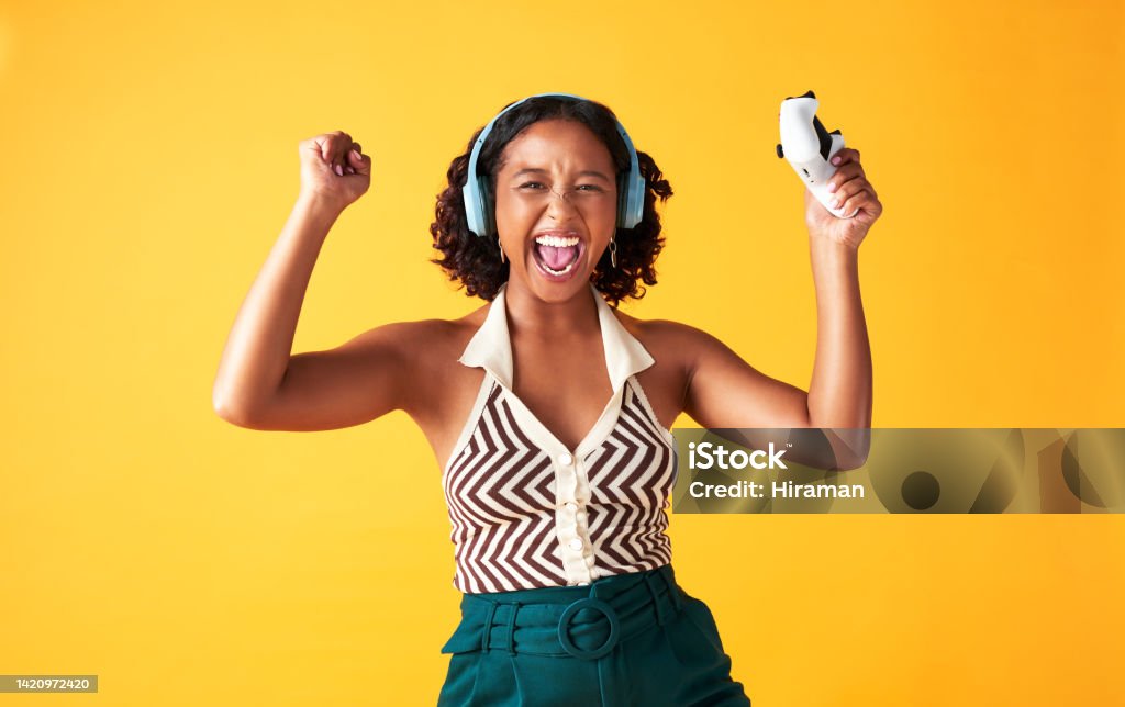 Winning, celebration and gaming woman happy about success in video game on yellow mockup studio background. Portrait of excited, happy and motivation face of African gamer of online competition Woman fitness, motivation and barbell workout in wellness gym for sports training, exercising and healthy muscle growth. Weightlifting bodybuilder, personal trainer and people coach in exercise room Control Stock Photo