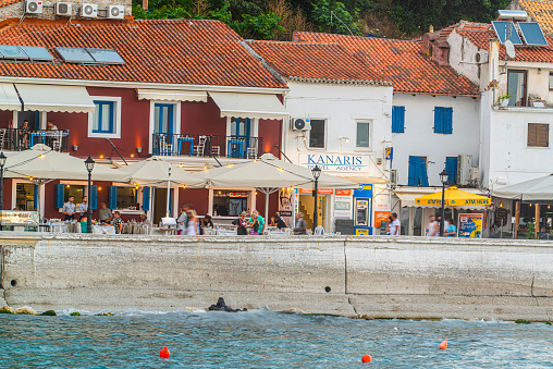 09 June 2022, PARGA, GREECE, Panoramic view of the amazing coastal city of Parga at daylight with beautiful, decorated streets, buildings, shops, and restaurants.