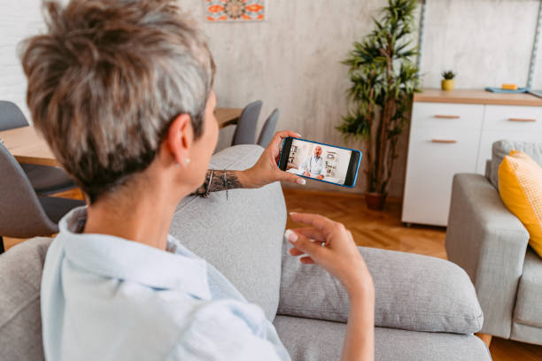 istock Senior Woman Having A Doctor's Appointment Online 1420974307