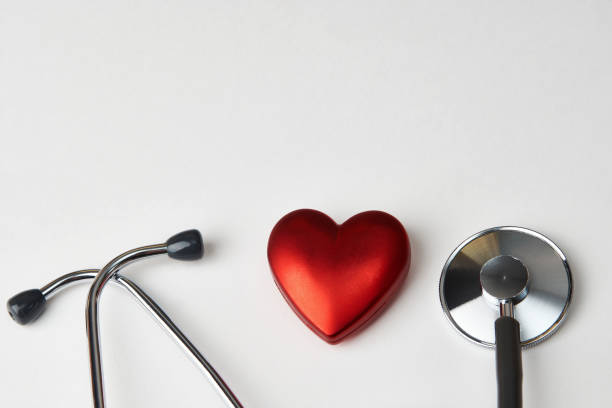 istock Red heart and a stethoscope on a white background 1420983049
