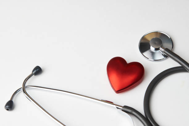 istock Red heart and a stethoscope on a white background 1420983053