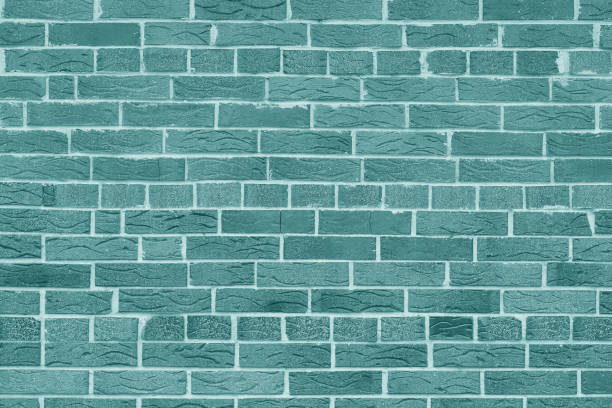 istock Brick wall with unusual blue bricks made of whole blue bricks and broken blue bricks 1420985649