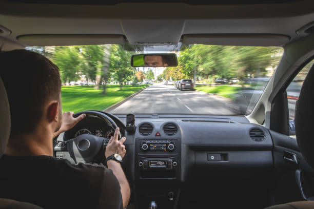 istock Hands on the wheel when driving at high speed from inside the car. 1420991724