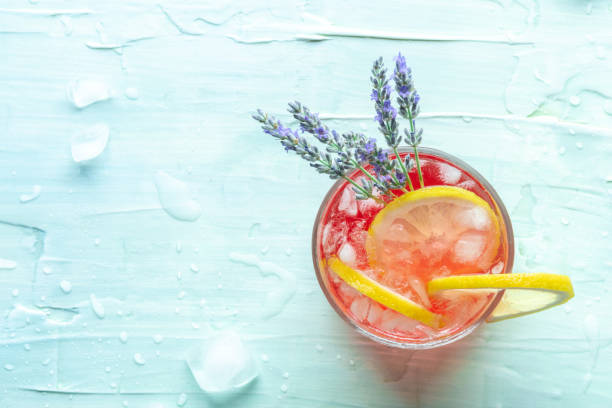 istock Fresh summer cocktail or mocktail with lemon and lavender, a cold citrus drink 1420996535