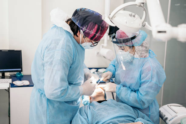 istock Working with Patient in Dental Clinic 1420999714
