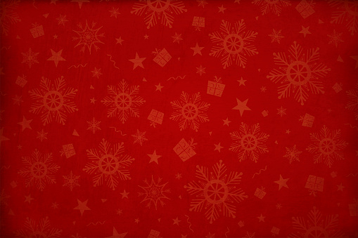 Dark maroon, deep red coloured gradient paper textured effect wall texture Xmas vector starry background, wallpaper- horizontal. Different sized dull pale reddish colored gift boxes, snowflakes, stars and swirls allover the wall paper. Can be used as Christmas, New Year party wallpaper, celebration, festive backdrop or gift wrapping paper sheet template.