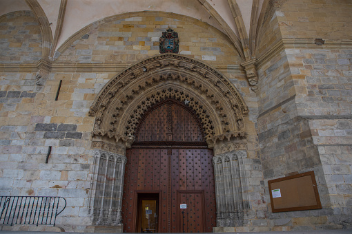 couple standing outside Girona Cathedral doors