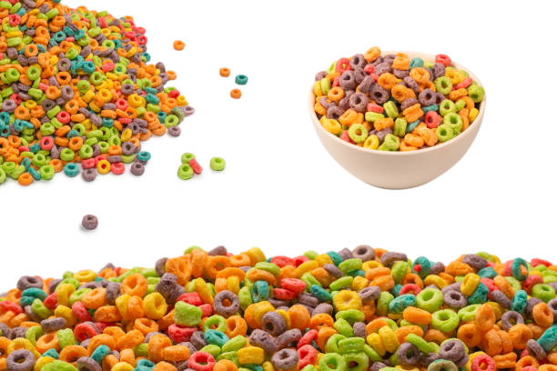 istock Colorful rings cereal spill out into a bowl. Breakfast. Isolated. 1421013786