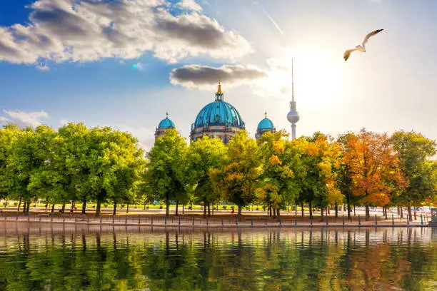 Photo of Beautiful park at the river near Berliner Dom or Attractive cathedral on Museum Island, Germany