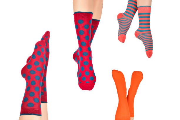 istock Woman in red socks isolated on white background. Top view. 1421019421