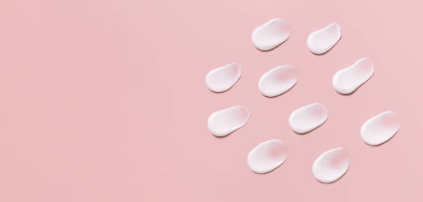 istock cosmetic smears cream texture on pastel background 1421020083