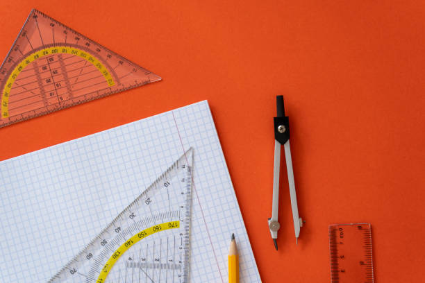 istock Ruler and pencil at open notepad. Accessories for learning mathematics. Education, Back to school concept 1421022004