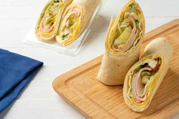 istock Fresh tortilla wraps with chicken and fresh vegetables 1421024994