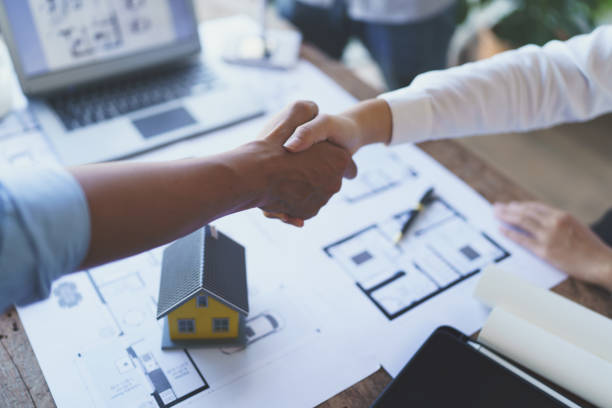 istock Meeting and greeting, Two engineer or architect meeting for project, handshake after consultation and conference new project plan, contract for both companies, success, partnership 1421030240