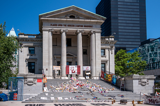 Vancouver, British Columbia - July 23, 2022: Symbols left at the Vancouver Art Gallery in memory of the children who died at the Kamloops Residential School.
