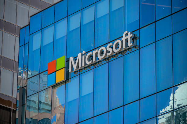 Microsoft logo Vancouver, British Columbia - July 23, 2022: Microsoft logo on an office tower exterior in downtown Vancouver. microsoft stock pictures, royalty-free photos & images