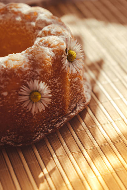 Sweet dessert on display in vintage style on a wooden stand. Rustic pastry shop style