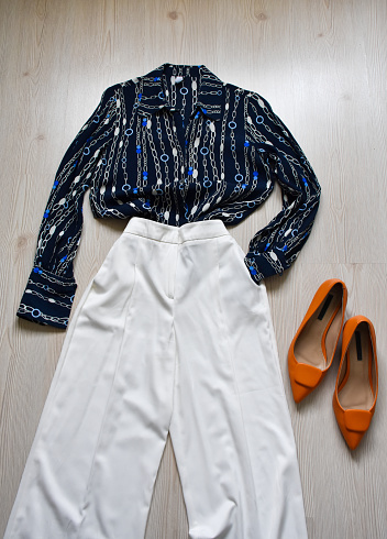 Women's fashion, casual clothing shirt, white pants and shoes
