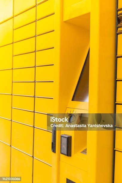 Modern Yellow Shopping Locker Bar Code Reader For Skans Qr Code On Mobile Phone Selfservice Locker Cell Modern Shipping And Delivery Concept With Contactless Automated Postal Box Parcel Locker Stock Photo - Download Image Now