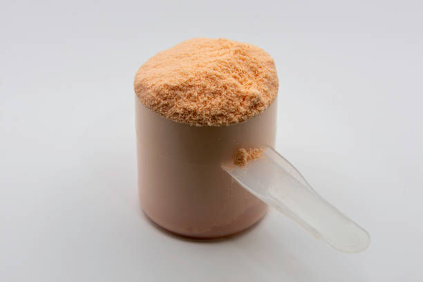 istock Supplement Whey Protein Scoop Strawberry 1421038200