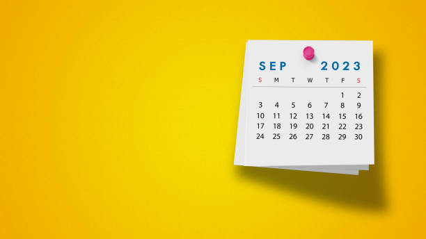 istock 2023 September Calendar on Note Pad Against Yellow Background 1421038486