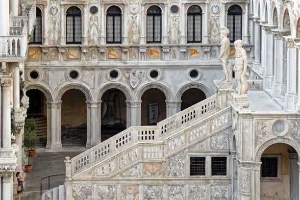Doge's Palace with the staircase Scala dei Giganti in Venice Doge's Palace with the Scala dei Giganti staircase in Venice neptune roman god stock pictures, royalty-free photos & images