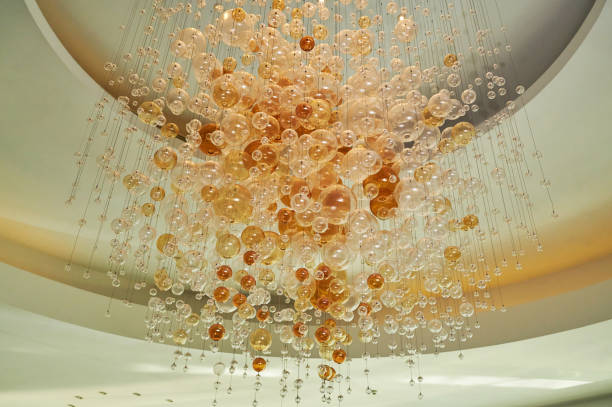 Ceiling luminous chandelier in the interior