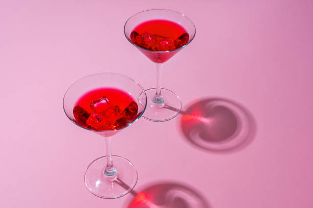 istock Cold and refreshing cocktails on color background 1421043668
