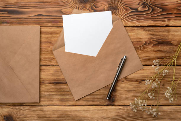 istock Vintage letters mock up on a wooden table flat lay with copy space 1421043728