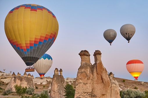 Balloons in rose valley, Cappadocia. Spectacular flight in Goreme. Turkey