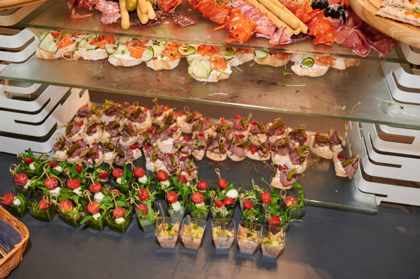 istock salads in cups, canapki, fish sandwiches, cold appetizers 1421052394