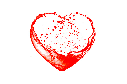 Red water splash heart shape on a white background with copy space