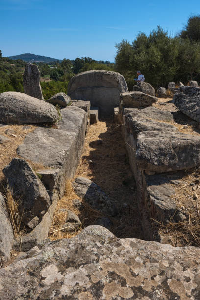 istock giants' tomb, (neolithic funerary graves), and standing stones. - sardinia - italy 1421058364