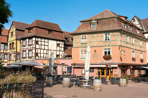 Colmar, France – August 28, 2022: Historic picturesque old town of Colmar in France in Alsace with many restaurants and cafes