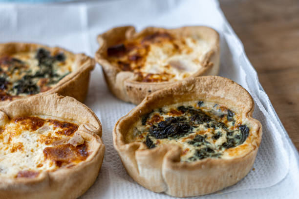 four quiches tray Close up, four homemade quiches on a tray spanish breakfast stock pictures, royalty-free photos & images
