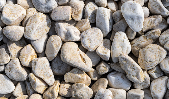 Background made of white rounded stones