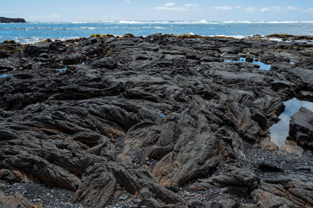 punaluu black sand beach along kau coast