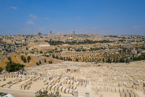 Jerusalem, Israel - August 12, 2022: View of al Aqsa Mosque , Temple Mount, Dome of Rock and old city of Jerusalem from the Jewish cemetery in Mount of Olives in Israel Palestine