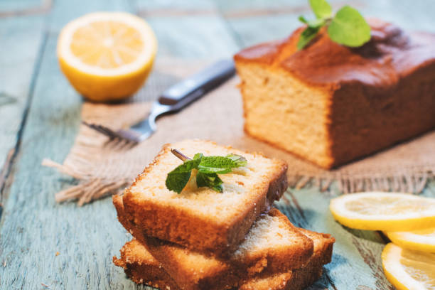 istock Lemon pound cake on rustic wooden background with lemon. 1421067650