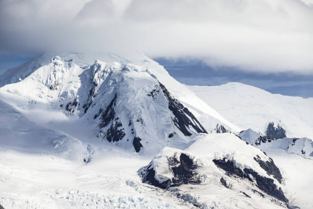 istock Glacier Covered Mountain Tops in Antarctica 1421068888