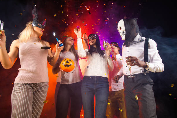 istock People dance at Halloween party 1421069123