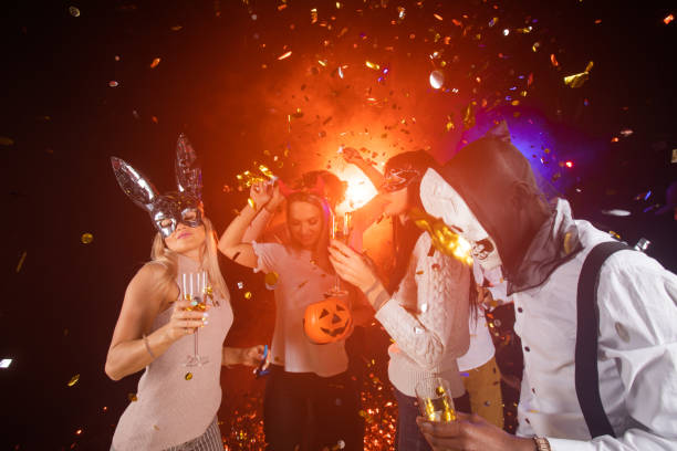 istock People dance at Halloween party 1421069155